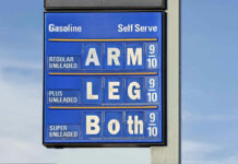 Price Shock Looms — $160 Oil WARNING… Gasoline price sign with humorous mode of payment.