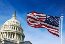 Washington HALTS Taiwan Arms Deal — Iran FIRST! U.S. Capitol building with waving American flag.