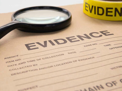 Evidence folder with magnifying glass and evidence tape.